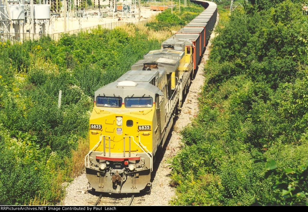 Empty coal train eases south